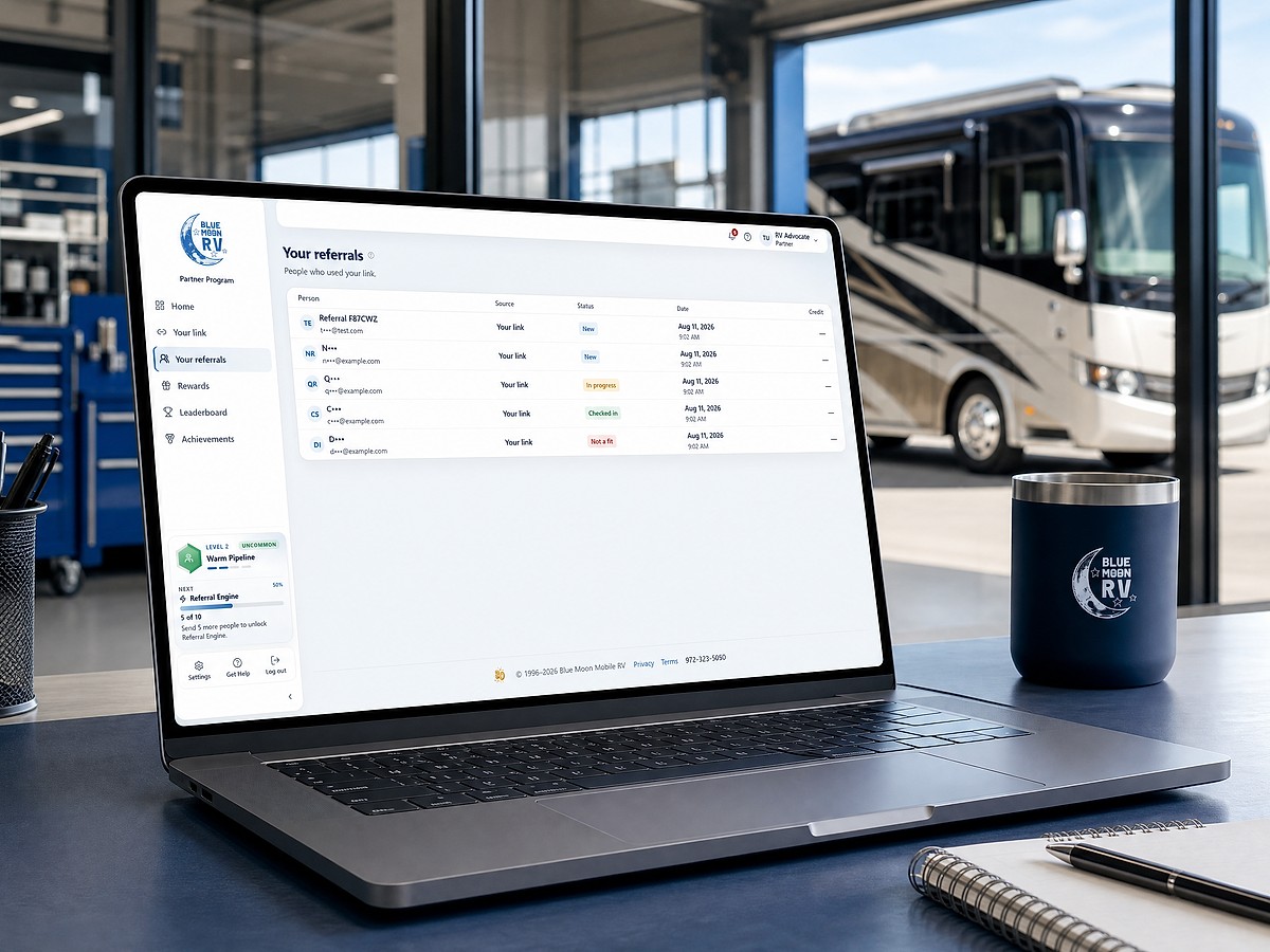 Blue Moon referral activity displayed on a laptop in an RV service office